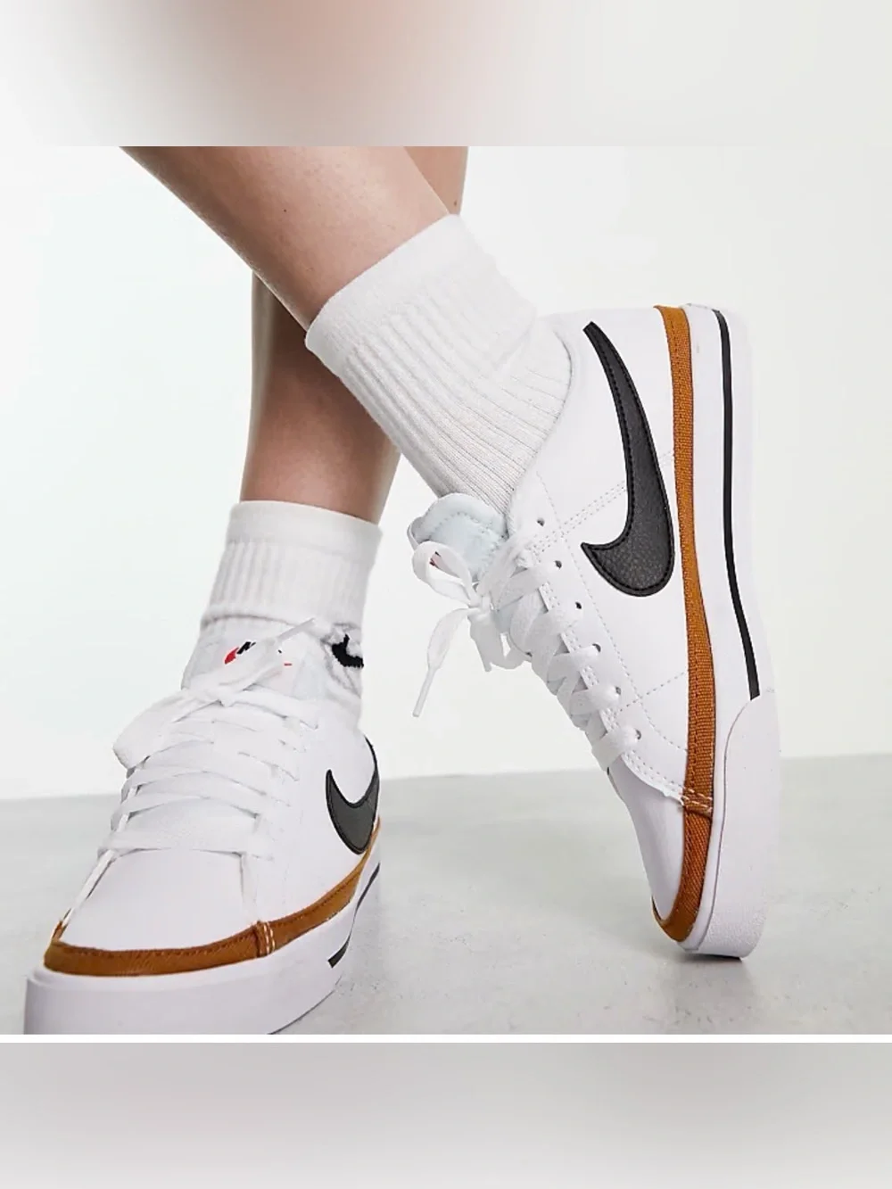 Nike court men’s White and black shoes